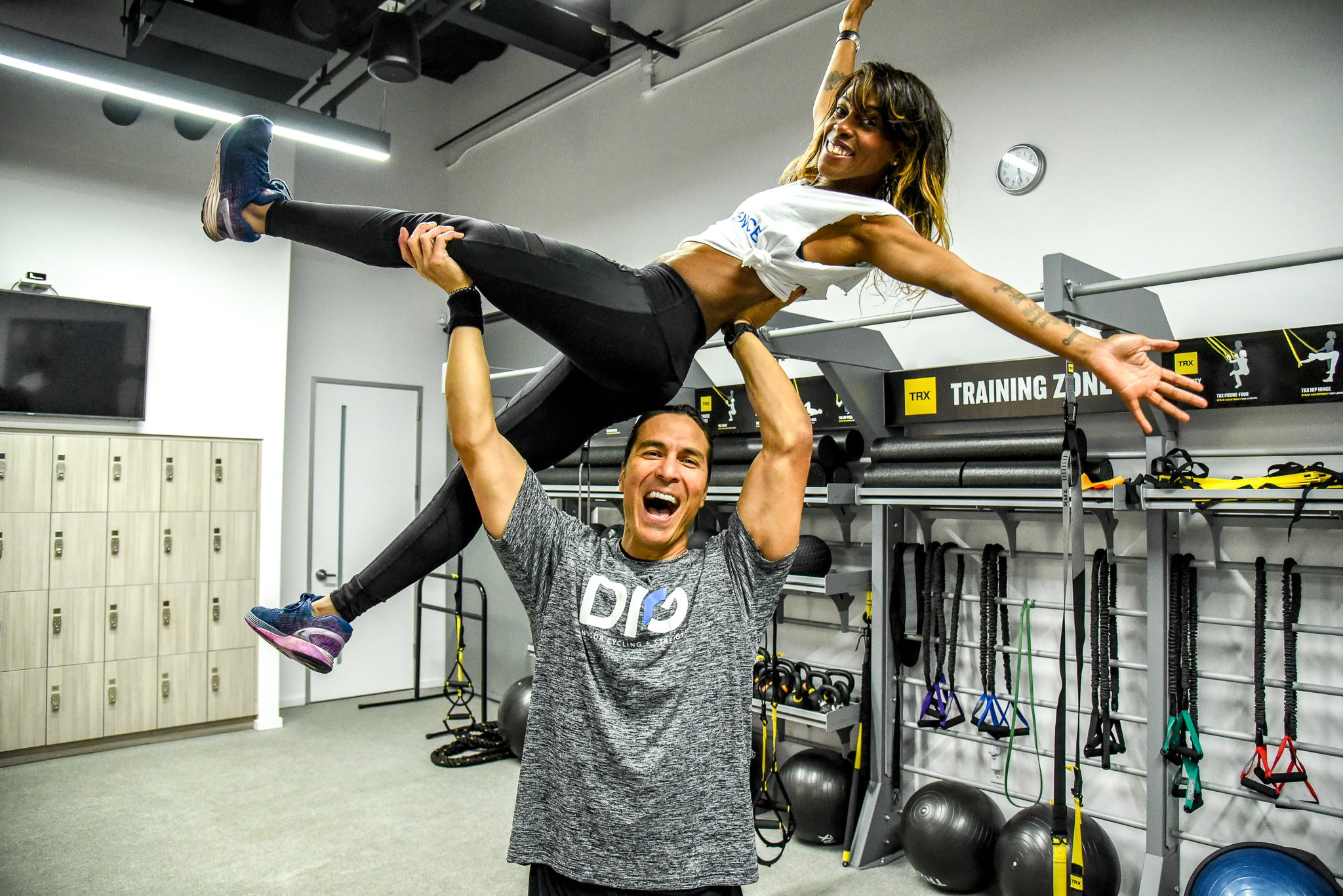 DIG instructor coaching in the strength training room